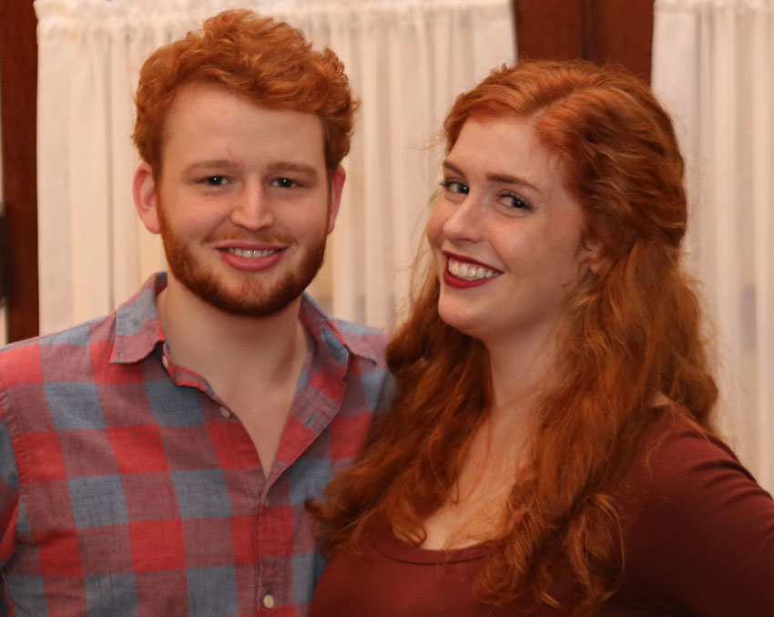 Man and woman with red hair.