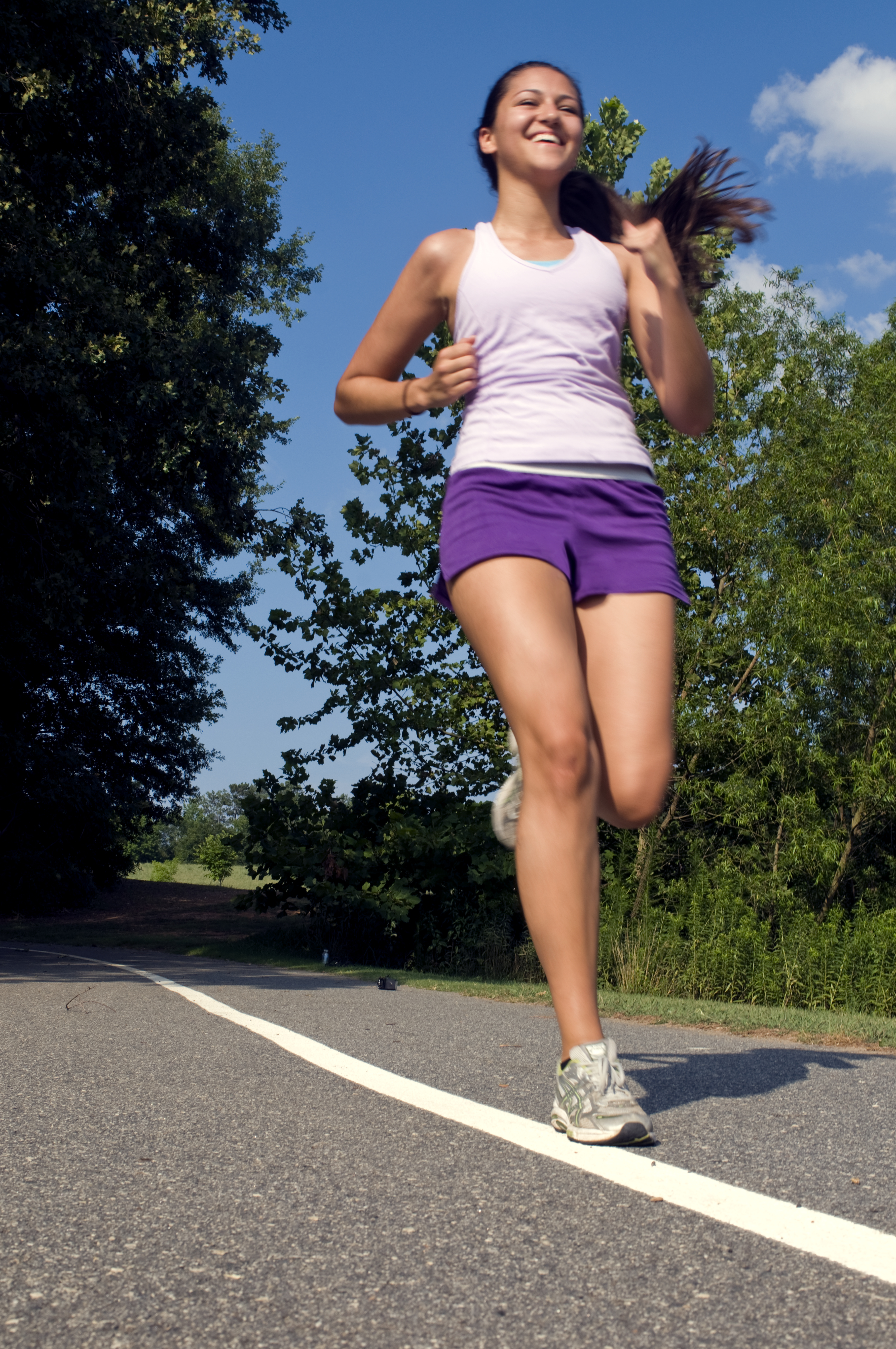 A young woman jogging outdoors