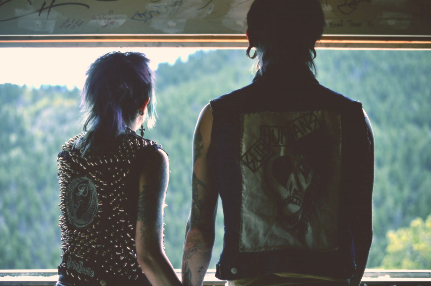 Teen couple watching the horizon